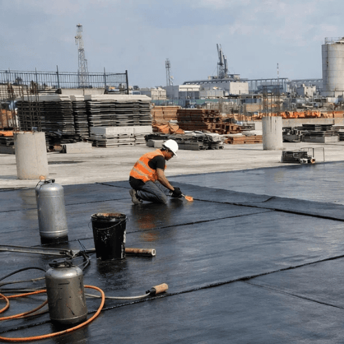 Symbole graphique représentant une surface protégée contre l’humidité dans un contexte d’étanchéité pour bâtiments à Port-Cartier